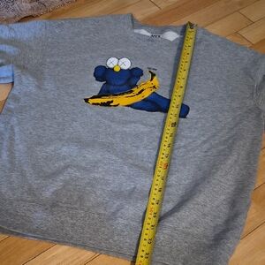 Uniqlo Kids Gray Sweatshirt with Blue and Yellow Design